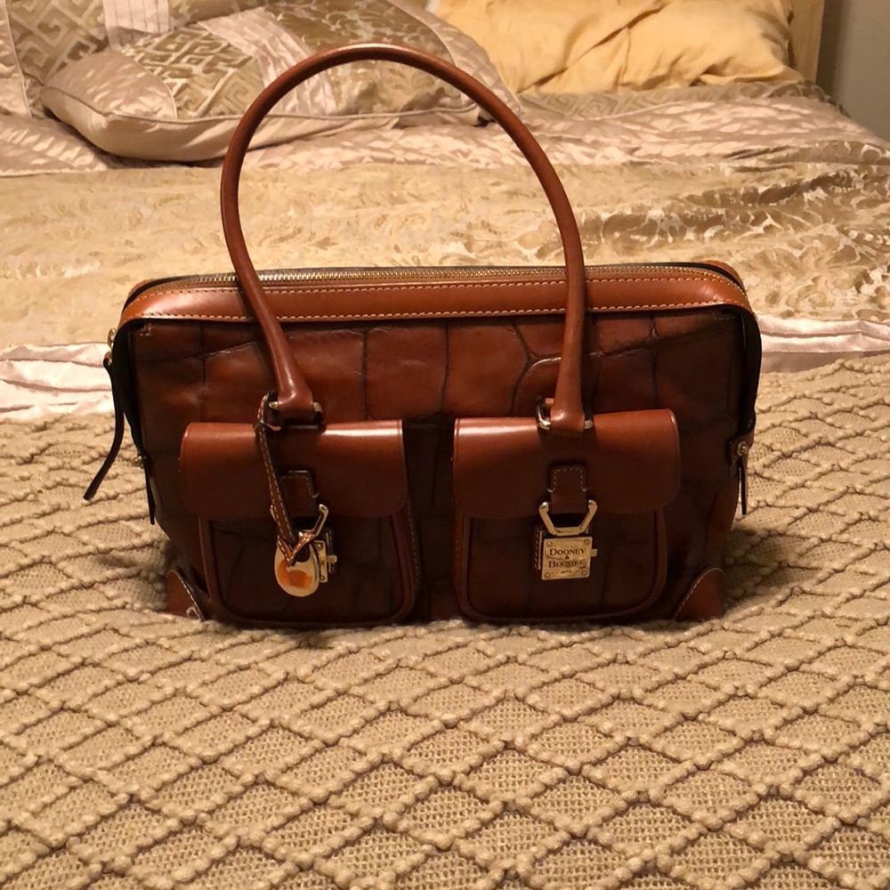 Dooney and Bourke leather bag w/ duster bag